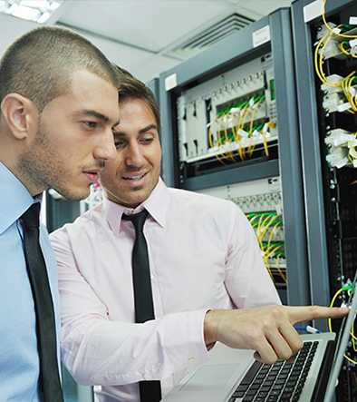 Network Support Services technicians inspecting computer servers